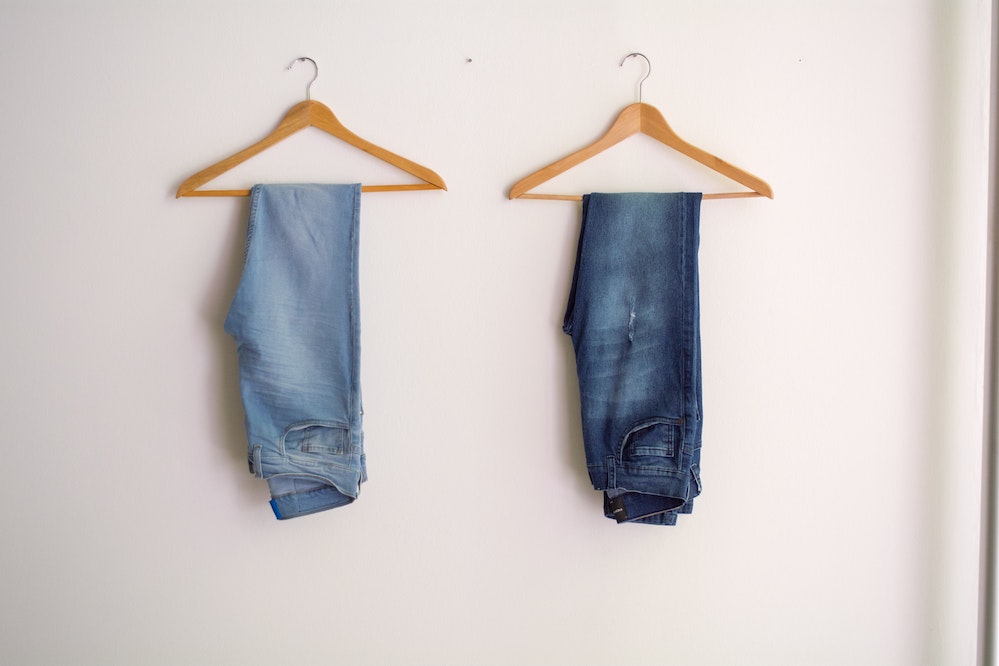 pair of hanged blue jeans